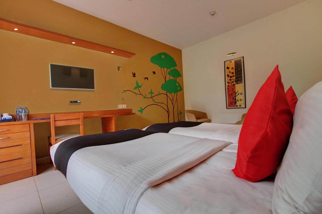 Capital O 16165 Cartier Hotell Bangalore Rum bild