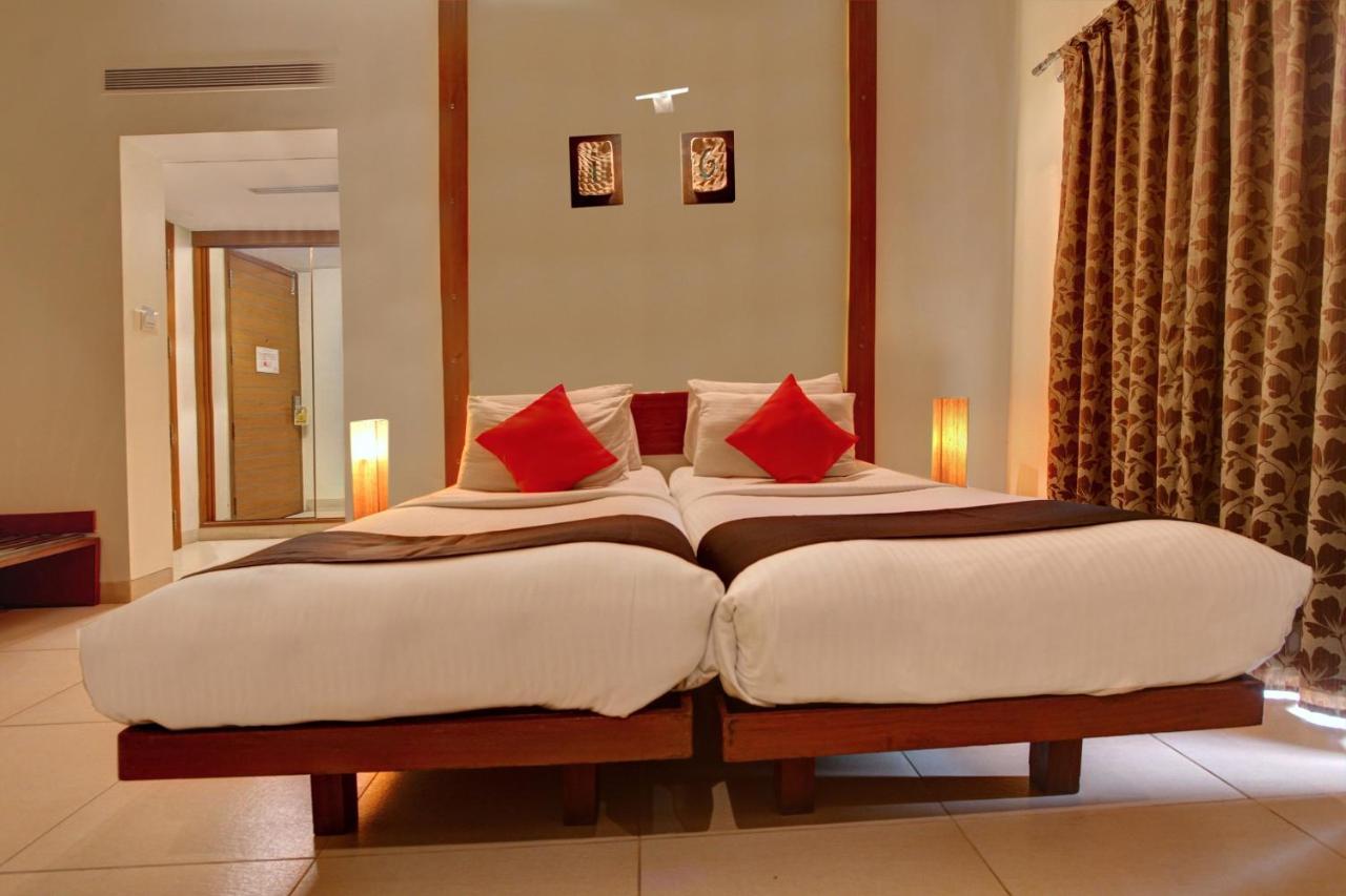 Capital O 16165 Cartier Hotell Bangalore Rum bild