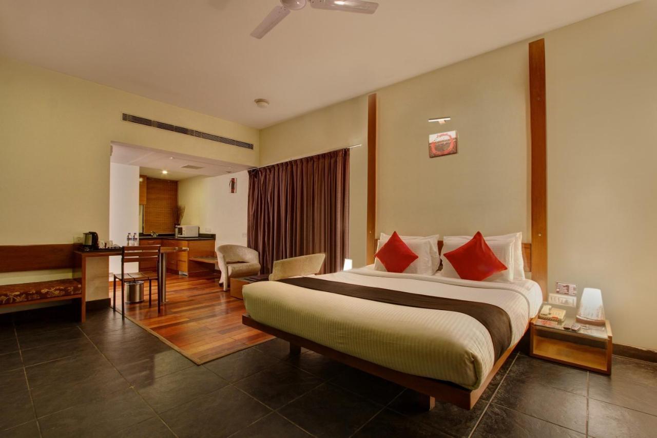 Capital O 16165 Cartier Hotell Bangalore Rum bild