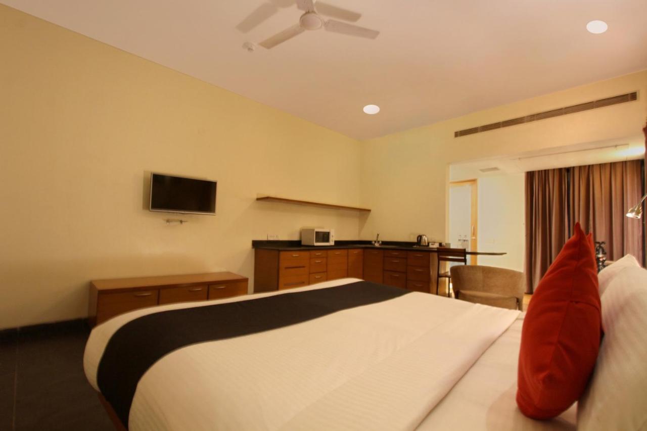 Capital O 16165 Cartier Hotell Bangalore Rum bild