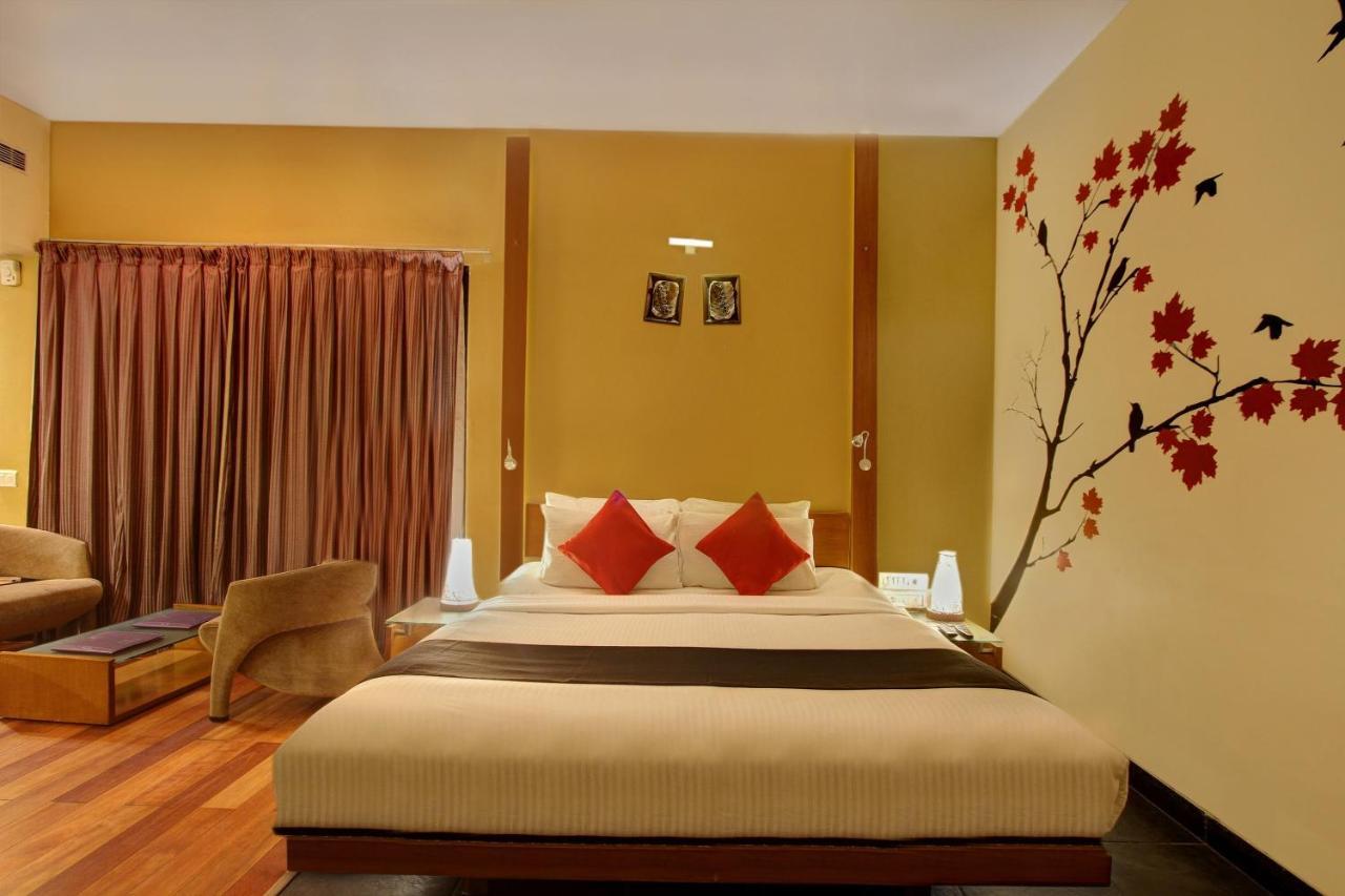 Capital O 16165 Cartier Hotell Bangalore Rum bild